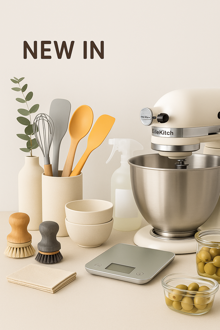 Modern kitchen gadgets and tools with colorful spatulas on a clean countertop — Ellekitch new arrivals.