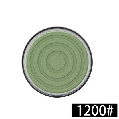 Detailed view of the 1200 grit whetstone sharpening disc compatible with the magnetic rolling knife sharpener, suitable for initial coarse sharpening